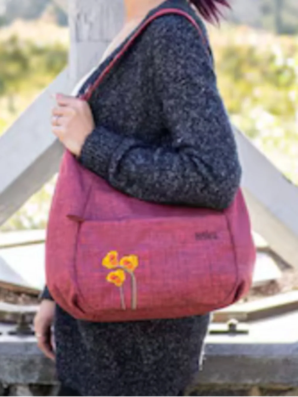Haiku Amble Hobo Bag in Rust Red with Yellow Floral Detail
